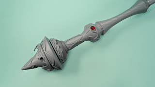 Close up of the pommel, the bottom, of Aerith's Garnet Rod.